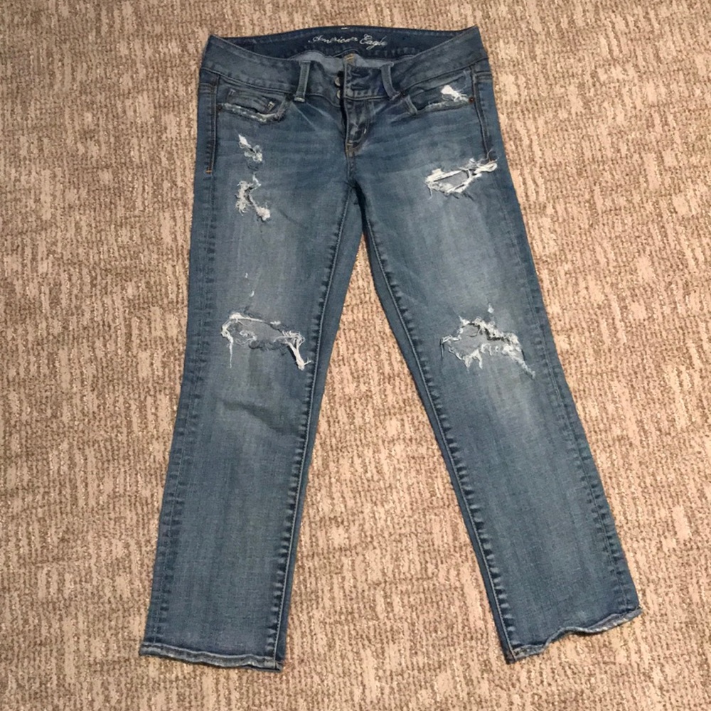 American Eagle light wash capris with holes